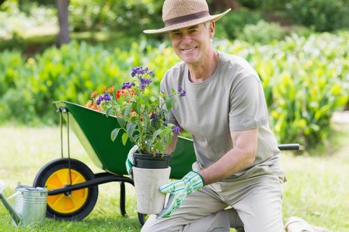 Local landscaping crew preparing a planting bed for flowers and shrubs
